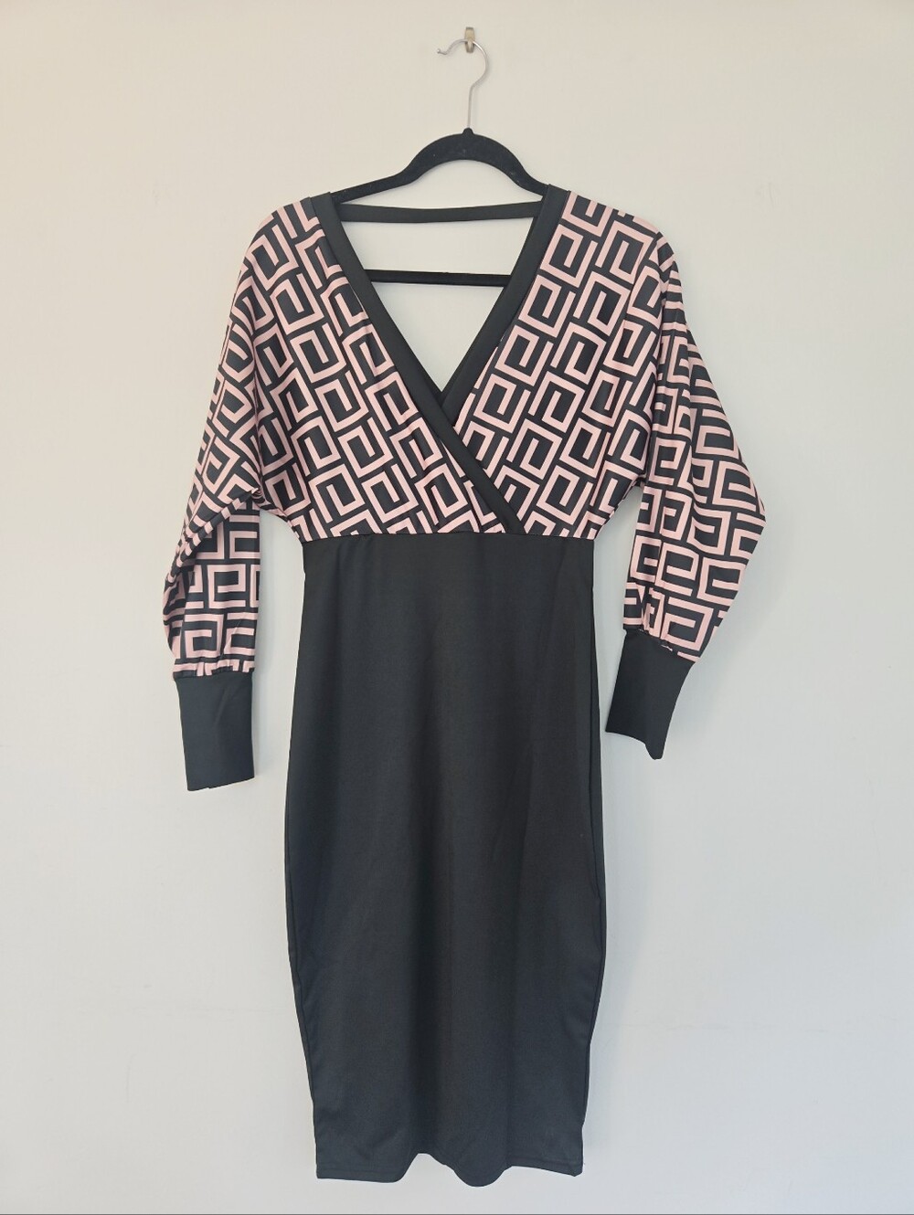 chic Black and Pink Geometric Wrap-Top Midi Dress